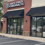 Family receiving personalized chiropractic care near Sixes Road in Canton, Georgia